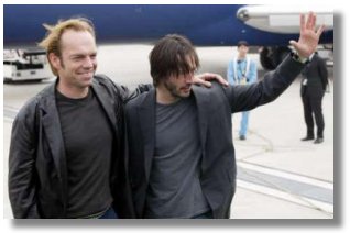 U.S. actor Keanu Reeves and Australian actor Hugo Weaving arrive at the New Tokyo International airport in Narita, east of Tokyo May 23, 2003. Reeves and fellow cast members are in Japan to promote the movie 'Matrix Reloaded', the sequel to 'The Matrix', which was released in 1999. Matrix Reloaded is due for release in Japan on June 7. REUTERS/Issei Kato