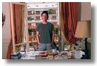 you can't really tell from this tiny thumbnail pic from Rex Features, but his desk is quite boisterously organized